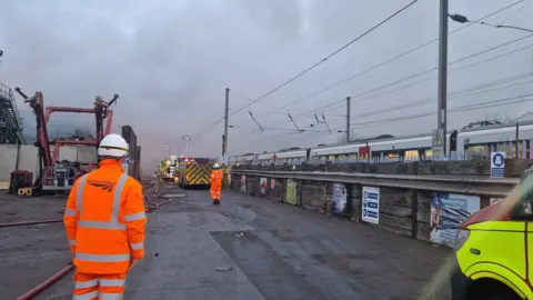 Suffolk Fire and Rescue Service Network Rail staff are assessing the situation