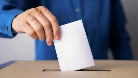 Getty/krisanapong detraphiphat Voting box and election image,election - stock photo