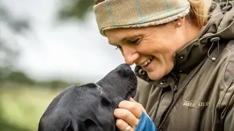 Ellena Nunneley woman with dog