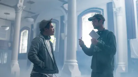 A24 films Directors Daniel Kwan and Daniel Scheinert on the set of Everything Everywhere All at Once