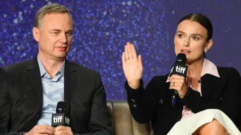 Getty Images Keira Knightley with Wash Westmoreland