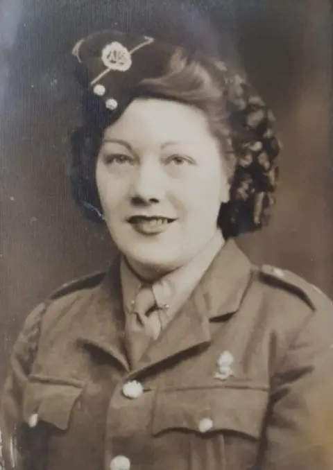 Supplied Mary in uniform