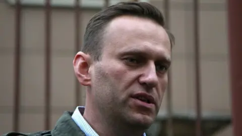 EPA Russian opposition leader and anti-corruption blogger Alexei Navalny speaks during break of an administrative hearing, at Simonovsky district court in Moscow (02 October 2017)