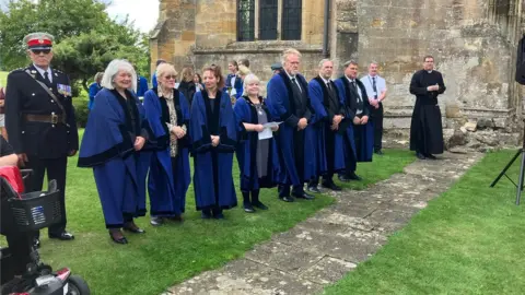 Tewkesbury councillors lined up in robes