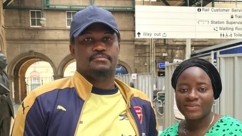 Hull rail passengers Azeri Oladeju, 35, and wife Adebusayo