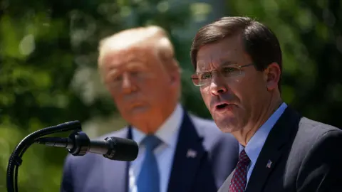 Getty Images Mark Esper and Donald Trump