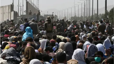 Getty Images From August 2021 - Hundreds make their way to the Kabul airport to be evacuated