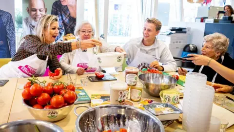 Getty Images Queen Maxima joined the Oma's Soep group for a cooking session