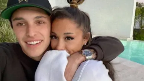 Ariana Grande/Instagram Ariana Grande and Dalton Gomez appeared together in the video for her song, Stuck With U