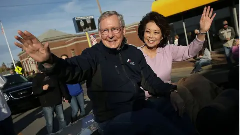 Getty Images Kentucky Senator Mitch McConnell and his wife, US Transportation Secretary Elaine Chao