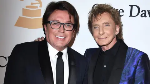 Getty Images Barry Manilow and Garry Kief