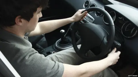 Getty Images Man driving
