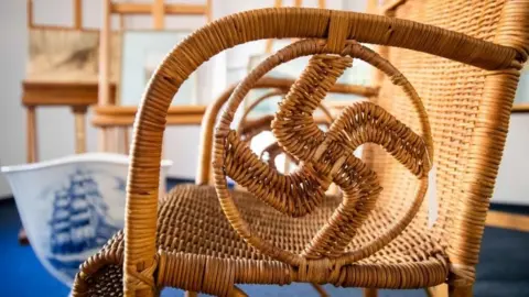 AFP A wicker chair with swastika shape in arms