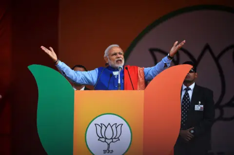 Getty Images Narendra Modi at a rally in Delhi in 2015