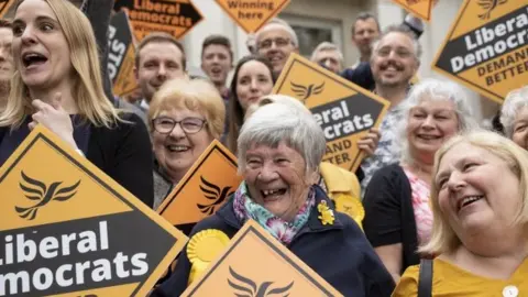 Getty Images Liberal Democrat activists in Chelmsford on 3 May