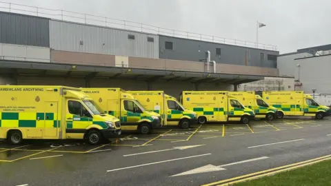 Ambulances outside Ysbyty Gwynedd hospital in Bangor on Tuesday, 3 Jan