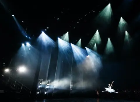 Danny Lawson / PA Media A ballerina during a dress rehearsal at Leeds Playhouse