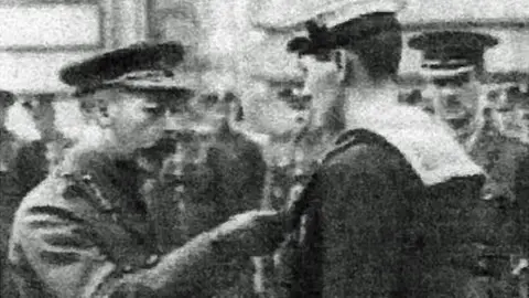 Courtesy of William Williams VC’s family Seaman William Williams being awarded the Victoria Cross in 1917