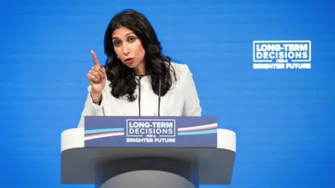 PA Media Suella Braverman at the Tory party conference in 2023