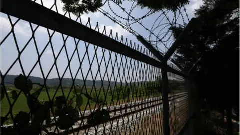 Chung Sung-Jun Barbed-wire fence is seen at the Imjingak Pavilion, near the demilitarized zone (DMZ) on June 16, 2020 in Paju, South Korea.