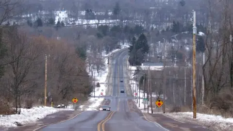 BBC The church (top left, with blue domes) overlooks what was Centralia