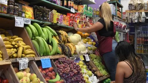 EPA-EFE/REX/Shutterstock Fruit shop in in Buenos Aires, Argentina.