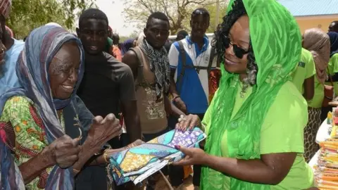 Iby Ikotidem Iby Ikotidem (R)