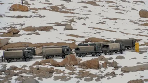 Anbarasan/BBC A convoy of Indian trucks