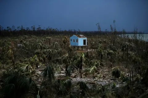 LOREN ELLIOTT / Reuters A destroyed house is seen in the wake of Hurricane Dorian in Marsh Harbour, Great Abaco, Bahamas, 8 September 2019.