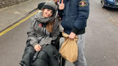 Olive Olive in wheelchair