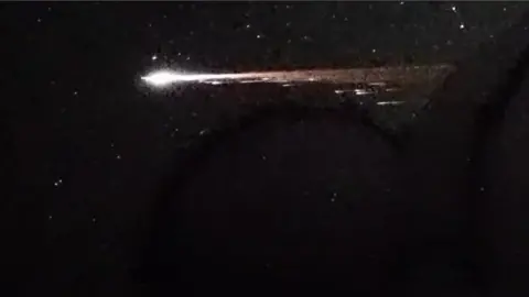 Object burns up as it re-enters Earth's atmosphere