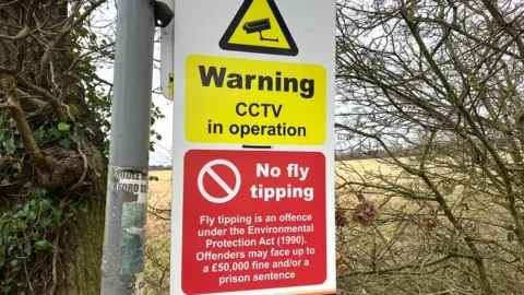Andrew Sinclair/BBC Basildon Council anti-fly tipping sign