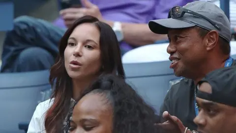 Getty Images Erica Herman and Tiger Woods at the US Open in August2022