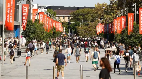 Getty Images Students walk through an Australian university campus