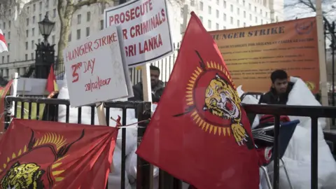 Getty Images Tamil demonstrators in London protest against the Sri Lankan government