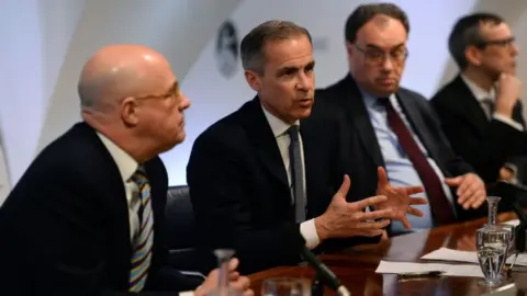 Getty Images Mark Carney (second from left) Bank of England governor