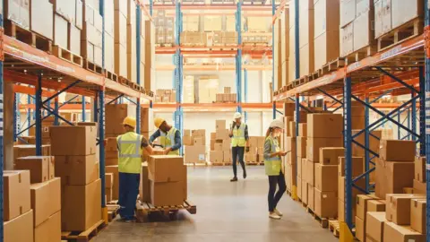 gorodenkoff Workers in a warehouse