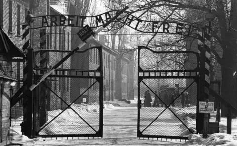 Keystone/Getty Gates at Auschwitz