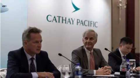 AFP Rupert Hogg, John Slosar and Paul Loo