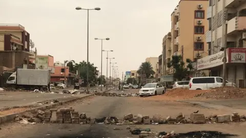 Getty Images Deserted street in Khartoum, 4 June