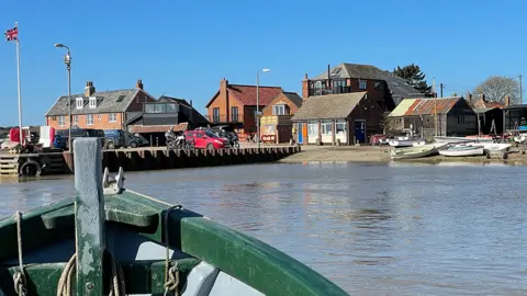 Mike Liggins/BBC The view of the quay at Orford Ness from the National Trust ferry