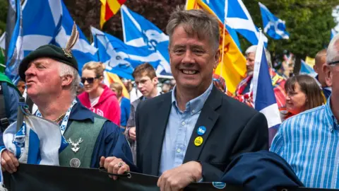 Getty Images Keith Brown at independence march