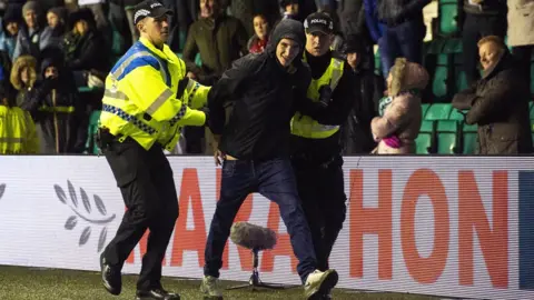 SNS Group Ross MacDonald Cameron Mack is arrested