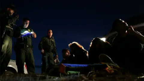 Reuters Border patrol agents apprehend immigrants who illegally crossed the Mexico-U.S. border near McAllen