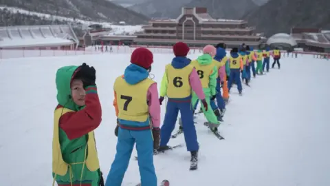 AFP/Getty Images This photo taken on February 19, 2017 shows members of a 'ski camp' at the Masikryong ski resort