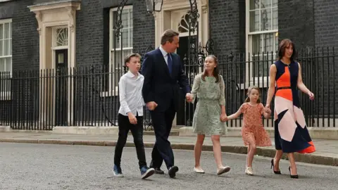 AFP David and Samantha Cameron leave Downing St with their children