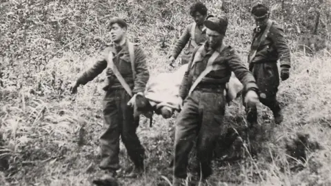 Soldiers of Gloucestershire Museum Stretcher party coming off Gloster Hill