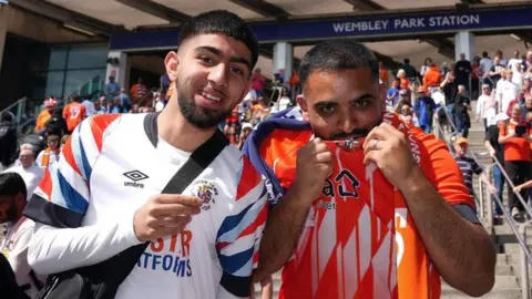 PA Wire Luton Town fans at Wembley