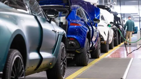 Getty Images Aston Martin DBX sport utility vehicles (SUV) on the final assembly line at the Aston Martin Lagonda Global Holdings Plc factory in St Athan,