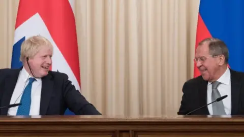 PA Boris Johnson and Sergei Lavrov